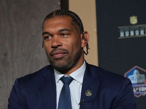 Julius Peppers shows off his Hall of Fame locker