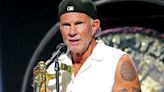 Red Hot Chili Peppers' Chad Smith honors the late Taylor Hawkins at MTV VMAs