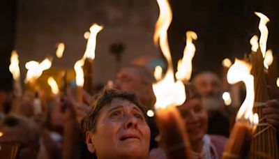 Orthodox worshippers greet ancient ceremony of the Holy Fire in Jerusalem