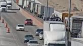 Stalled semitruck causes complete stop on I-10 west at Redd Road