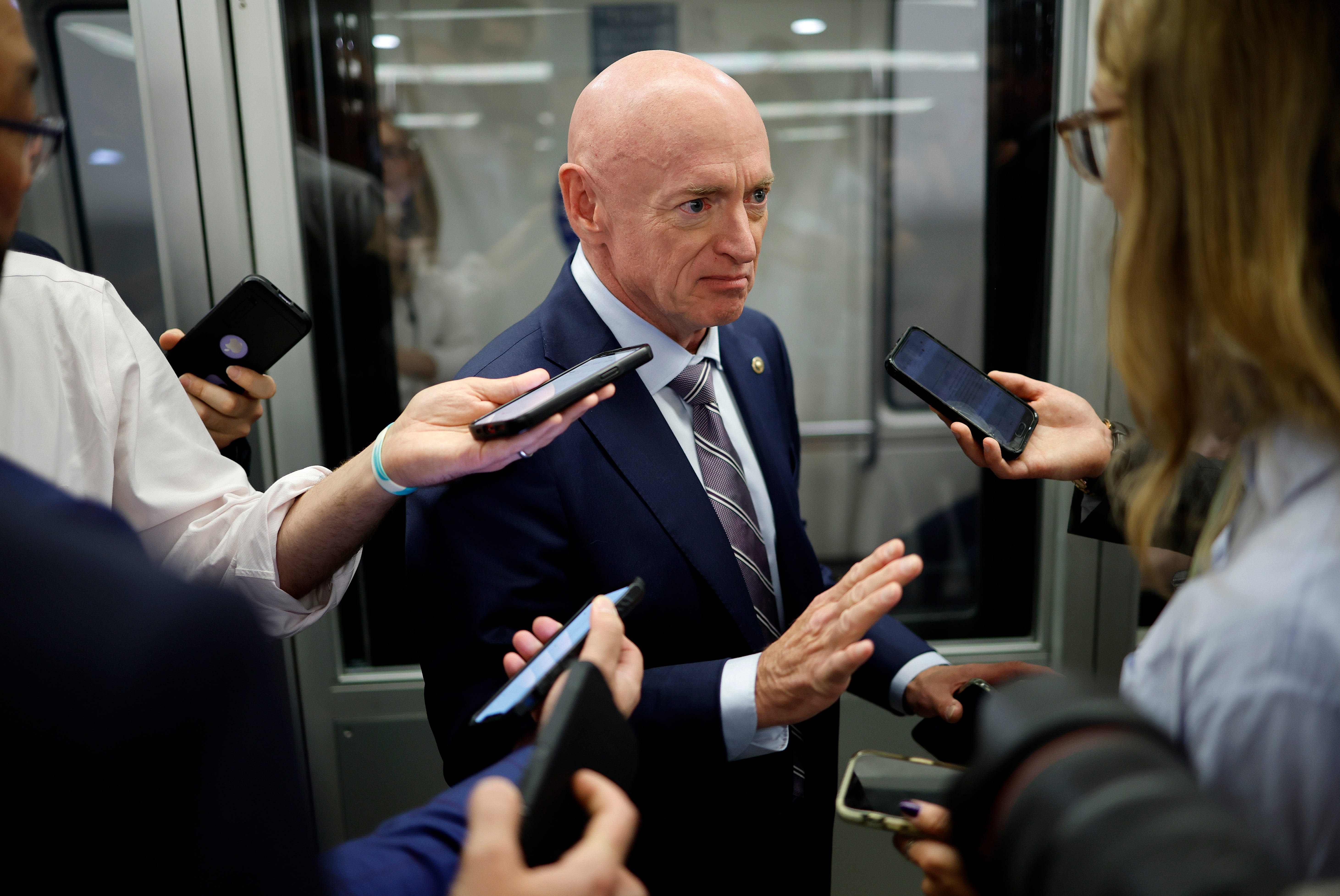 Is Sen. Mark Kelly in or out of Harris VP search? Posts on X stir intrigue
