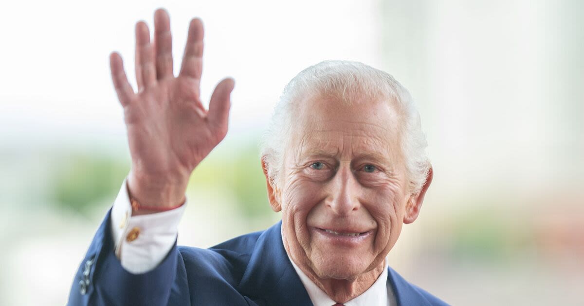 King Charles and Queen Camilla beam as they arrive at the Senedd in Cardiff