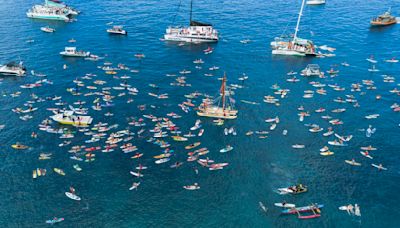 Maui remembers the 102 lost in the Lahaina wildfire with a paddle out 1 year after devastating blaze