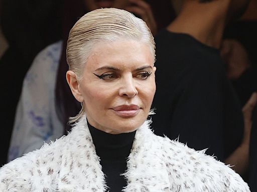 Lisa Rinna, 60, debuts platinum blonde hair at the Balenciaga PFW show