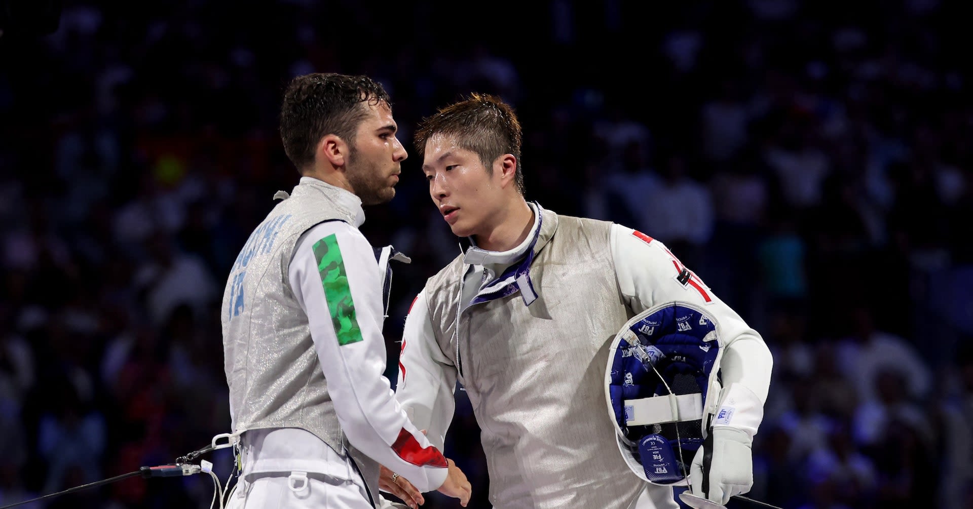 Fencing-Pineapple pizza insults fly over Italian-Hong Kong fencing final