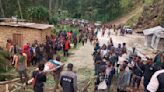 Emergency crews in Papua New Guinea move survivors of massive landslide to safer ground