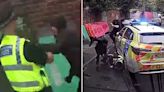 Horror moment cop is stabbed in the neck by hooded knifeman in random attack