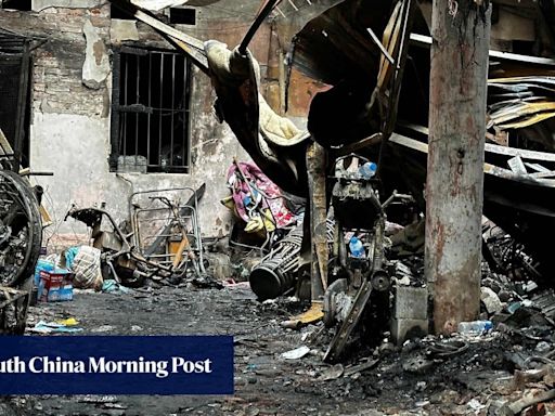 ‘Explosions like firecrackers’: fire engulfs building in Hanoi, killing 14