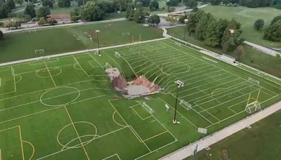 Massive sinkhole continues to grow after swallowing part of soccer field outside St. Louis