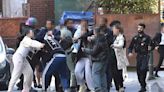 Violent brawl erupts outside Manchester Crown Court as police swarm area