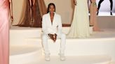 Naomi Campbell is the epitome of chic in a striking white suit