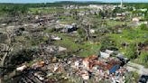 Severe storms batter the Midwest, including reported tornadoes that shredded a FedEx facility