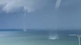 Four giant waterspouts appear off North Wales coast in 'beautiful and weird' display