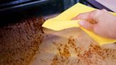 Magic 65p cleaning paste wipes away grease on oven glass in just 15 minutes