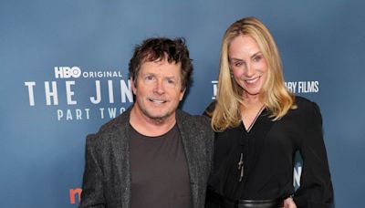 Michael J. Fox Totally Enamored by Wife Tracy Pollan’s Red Carpet Look in New Photos