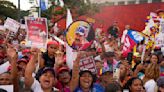 AP PHOTOS: Venezuelans rally ahead of election many see as biggest threat yet for President Maduro