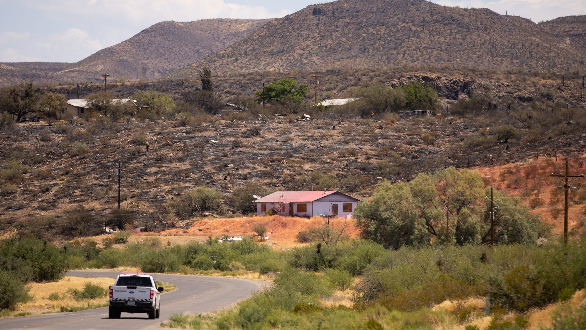 Man arrested on arson charge after Arizona wildfire destroyed 21 homes, caused evacuations