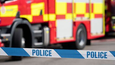 Two men arrested on suspicion of murder after women die in house fire