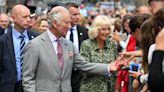 King and Queen make waves at the seaside on Cornwall trip