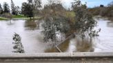 Update: Flood warnings for areas already wet near Fresno. Thunderstorm possible in Tulare