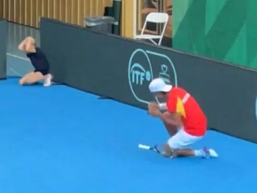 Davis Cup ballgirl drops to her knees after witnessing huge upset