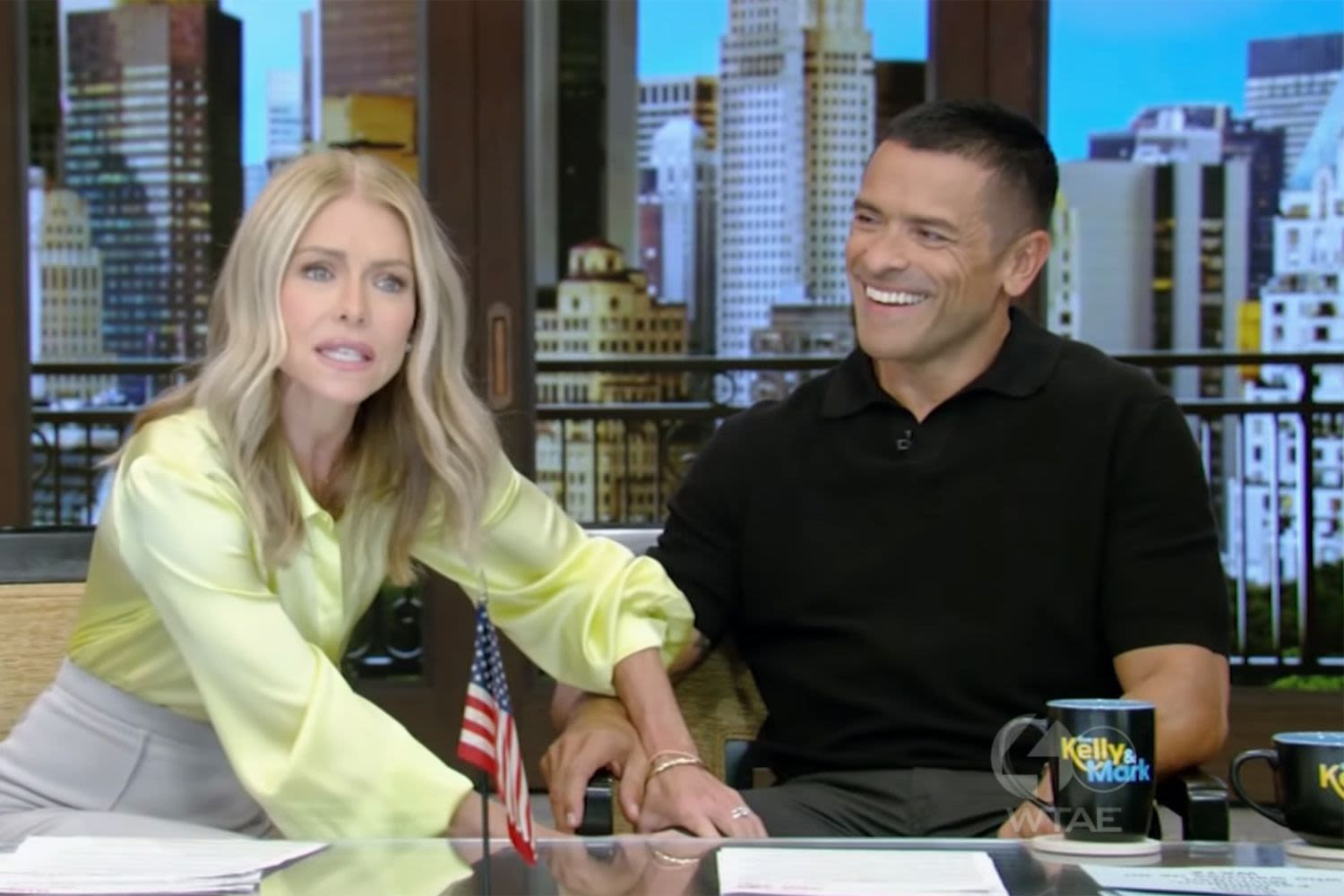 Kelly Ripa jokes about 'inappropriate' backstage moment she rubbed Mark Consuelos' thighs: 'Got a little handsy'