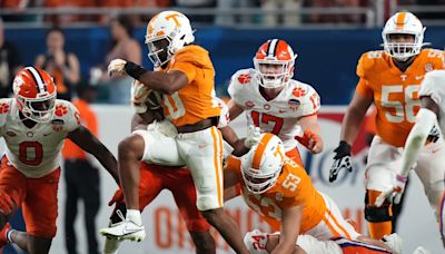 Dolphins trade into fourth round to select Tennessee speedster running back