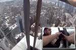 NYPD detectives jump over glass barrier to save distraught woman on ledge of 54-story NYC building, dramatic video shows