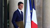 French PM resigns but to stay as head of caretaker government