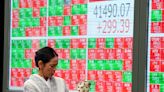 Stock market today: Asian stocks are mixed after Dow sets a new record