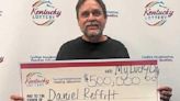 $500,000 lottery winner shares the wealth with store workers