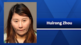 Woman charged after human trafficking uncovered at massage parlor