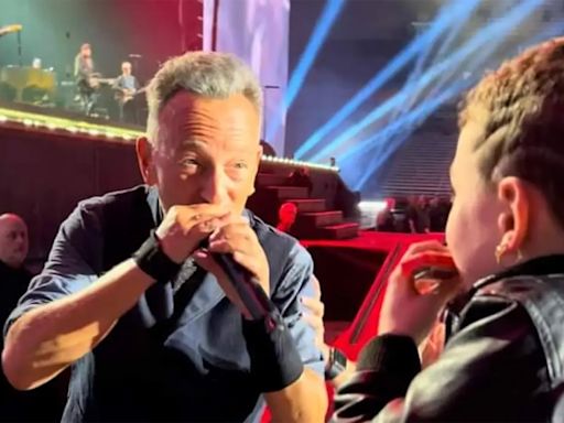 Harmonica kid: Bruce Springsteen gives young Syracuse fan a special moment, and souvenir