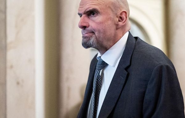 Sen. Fetterman takes off Harvard University hood during commencement speech, gets standing ovation