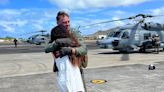 Sailor's sweetheart greets him with a hug after returning from deployment