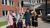 Steven Lorentz hoists the Stanley Cup at Kitchener, Ont. cancer centre