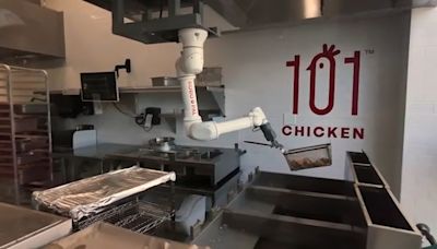 Robot chefs are cooking food at 101 Chicken, a Korean restaurant in Fort Lee, New Jersey