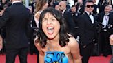 Topless, Screaming Protester Removed From Cannes Red Carpet (Photos)
