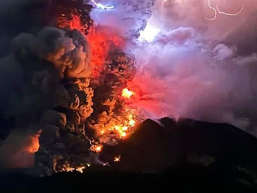 Tsunami alert issued after volcano erupts in Indonesia, with thousands told to evacuate