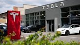 Ex-Tesla worker says he lost job despite sacrifices, including sleeping in car