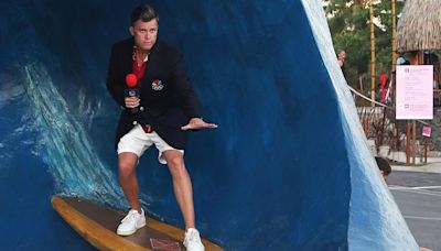 Colin Jost Jokes About Foot Injury Hosting Paris Olympics From Tahiti