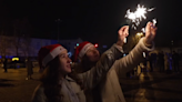 Ukrainians insist on celebrating New Year with parties and street gatherings despite curfew and missile strikes