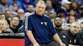 West Virginia’s men’s basketball head coach apologizes for ‘insensitive and abhorrent’ comments made on radio interview