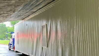 Tractor trailer stuck under Southwest DC bridge