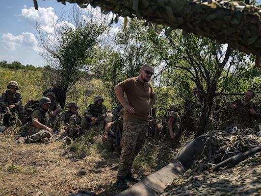 Ukraine is forming new army brigades but is unable to supply them all, military experts say