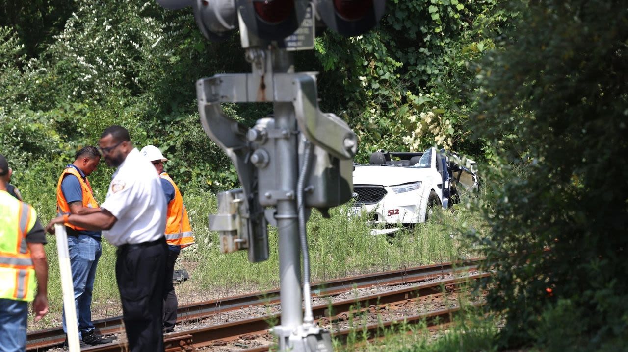 Investigators, family perplexed over taxi driver's path through flashing crossing gates in fatal Manorville crash