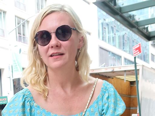 Kirsten Dunst is beautiful in blue floral dress in New York