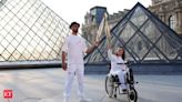 Olympics 2024: Olympic flame journey through Paris' landmarks - ​Olympic torch at Louvre Pyramid​