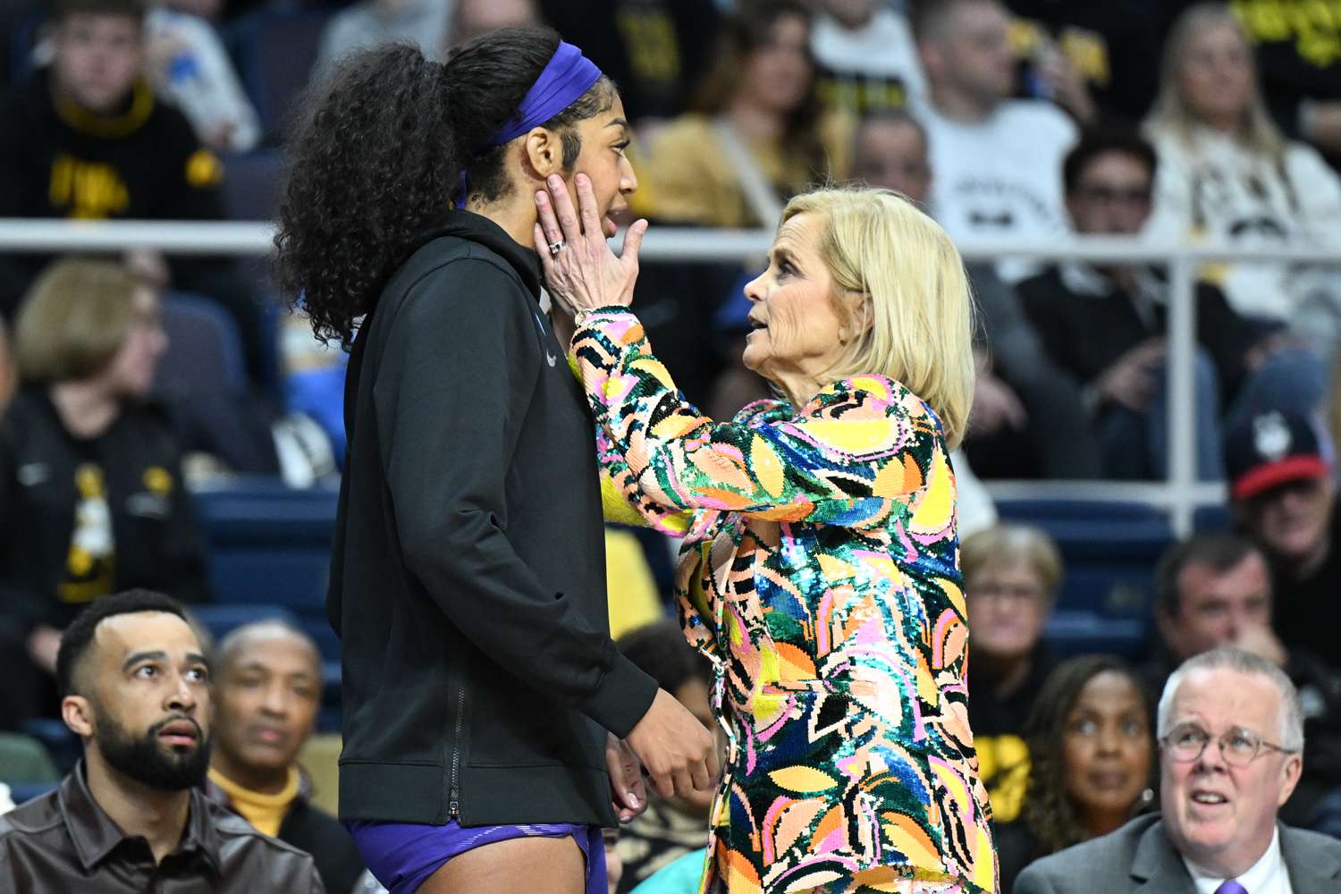 Angel Reese Has Sweet Reunion with LSU Coach Kim Mulkey During Sky-Mystics WNBA Game