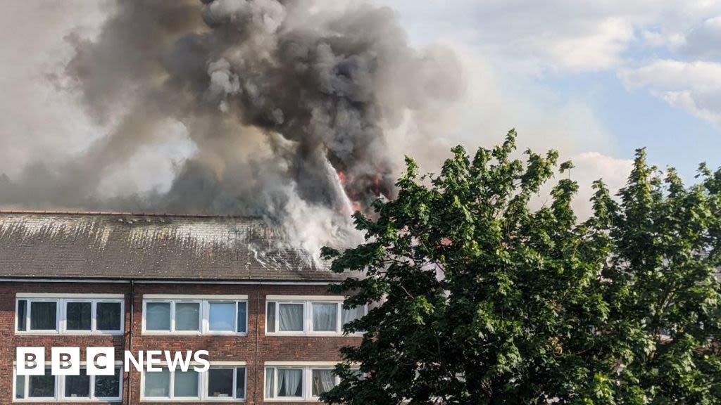 Hackney: About 100 firefighters tackle flat fire